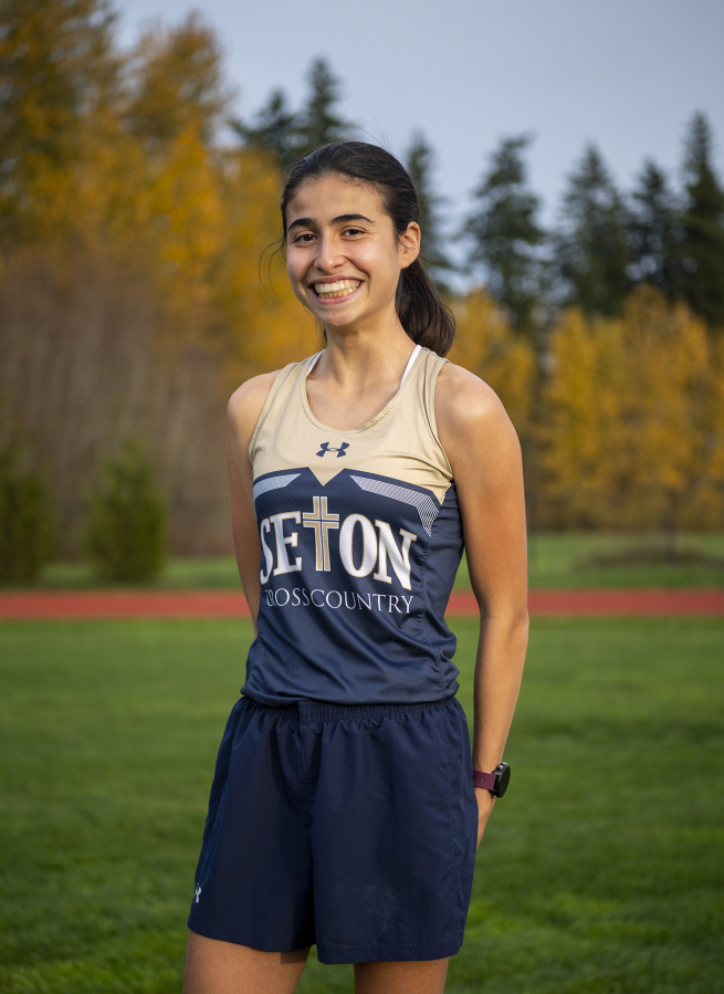 Seton Catholic sophomore Alexis Leone stands for a portrait Wednesday, Nov. 17, 2021, at Seton Catholic High School. Leone is the All-Region girls cross country runner of the year.