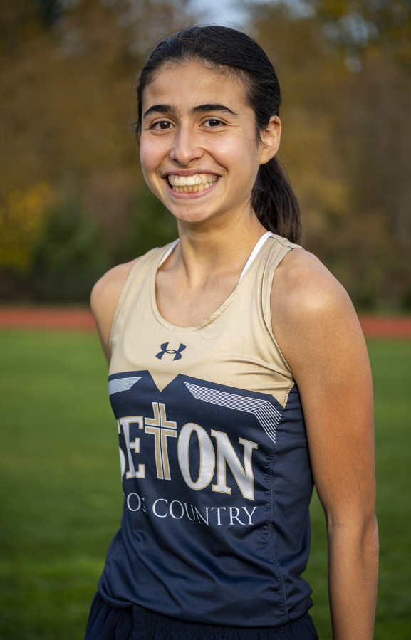 Seton Catholic sophomore Alexis Leone stands for a portrait Wednesday, Nov. 17, 2021, at Seton Catholic High School. Leone is the All-Region girls cross country runner of the year.