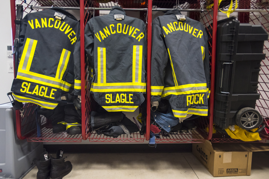 Vancouver firefighter turnouts are ready in the gear room of Vancouver Fire Station 2 in July 2019.