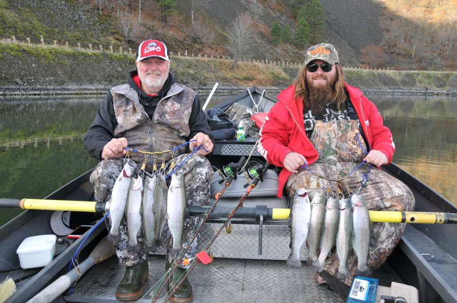 Chris Sessions and Blake Ramsey with a catch of Black Friday rainbow trout. They were fishing with Buzz Ramsey, one of the original anglers that pushed for the yearly event.