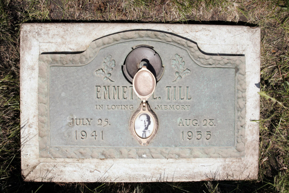 A plaque marks the gravesite of Emmett Till at Burr Oak Cemetery May 4, 2005, in Aslip, Illinois.