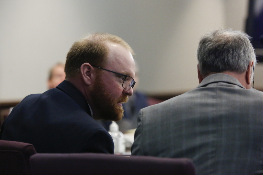 Defendant Travis McMichael looks on during his trial and of William "Roddie" Bryan and Gregory McMichael, charged with the February 2020 death of 25-year-old Ahmaud Arbery, at the Glynn County Courthouse in Brunswick, Ga., Tuesday, Nov. 23, 2021.