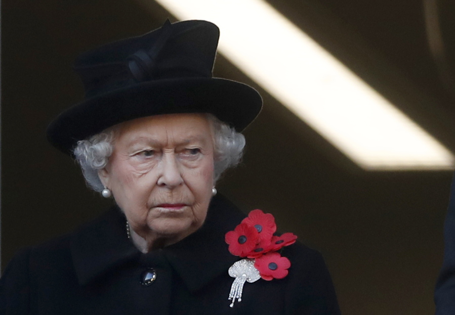 FILE - Britain's Queen Elizabeth II attends the Remembrance Sunday ceremony at the Cenotaph in London, on Nov. 11, 2018. Buckingham Palace says Queen Elizabeth II has sprained her back and will not attend the Remembrance Sunday service in central London to remember Britain's war dead, Buckingham Palace said Sunday, Nov. 14, 2021.