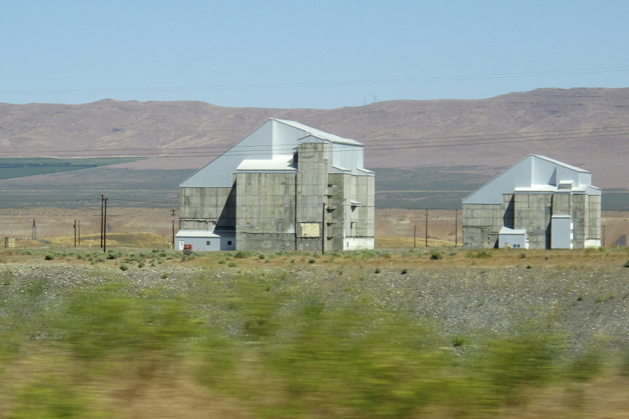 The decommissioned plutonium-producing DR Reactor, left, and D Reactor, right, are shown on the Hanford Nuclear Reservation near Richland in 2017.