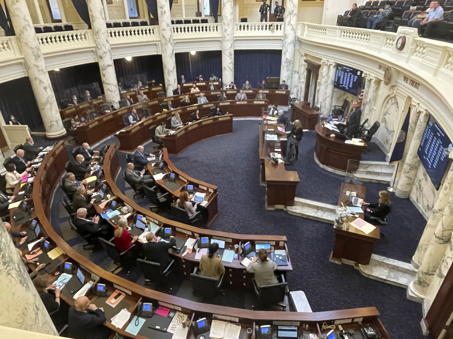 House members meet March 9 in the Statehouse in Boise, Idaho. An Idaho law banning nearly all abortions would take effect if the U.S. Supreme Court overturns Roe v. Wade, the landmark 1973 ruling that declared a nationwide right to abortion.