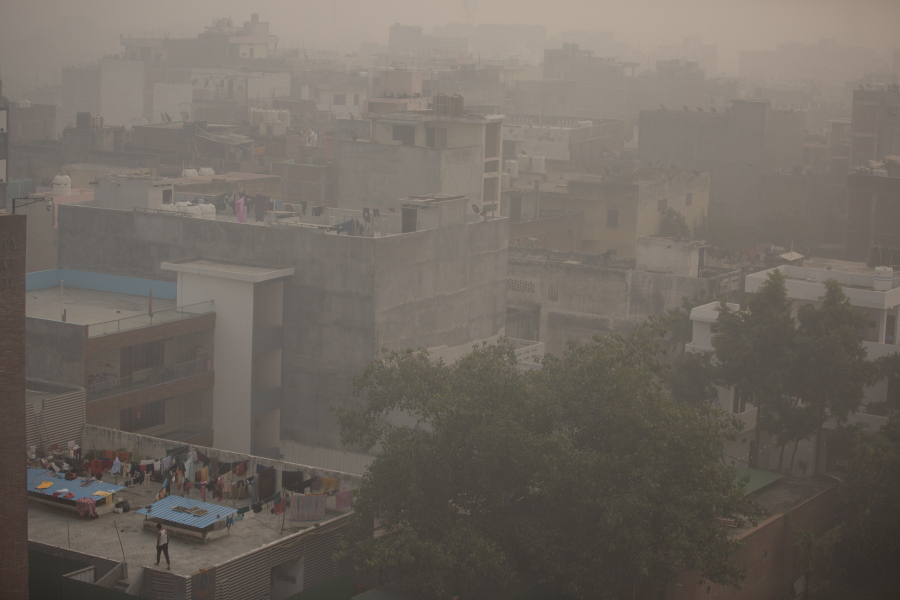 Morning haze and smog envelops the skyline in New Delhi, India, Friday, Nov. 5, 2021. New Delhi's pollution crisis worsened on Sunday as air quality hit dangerous levels, a problem that rears its head every winter.