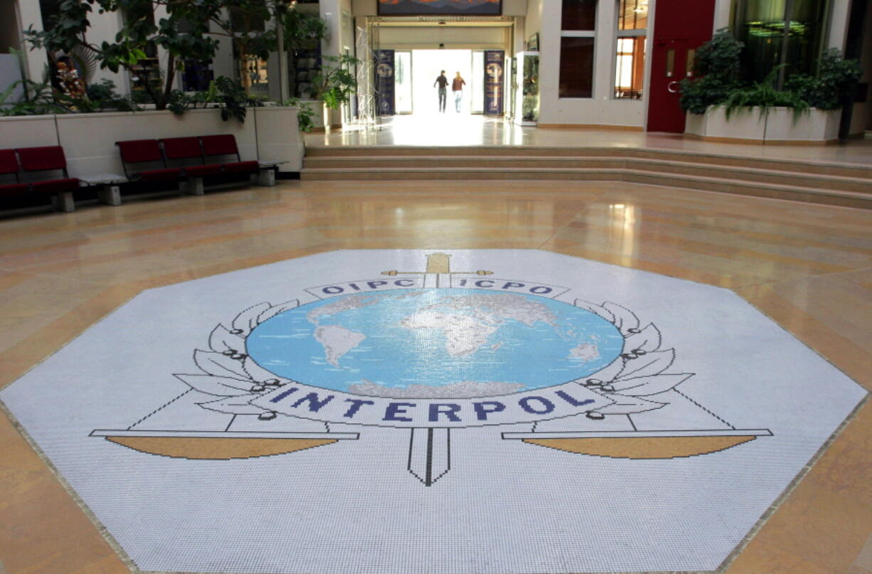 FILE - the entrance hall of Interpol's headquarters in Lyon, central France on Sept.27, 2017. The world police agency meets in Istanbul this week to elect new leadership. But human rights groups are warning that Interpol's powerful network of global cops could end up in the hands of authoritarian governments.