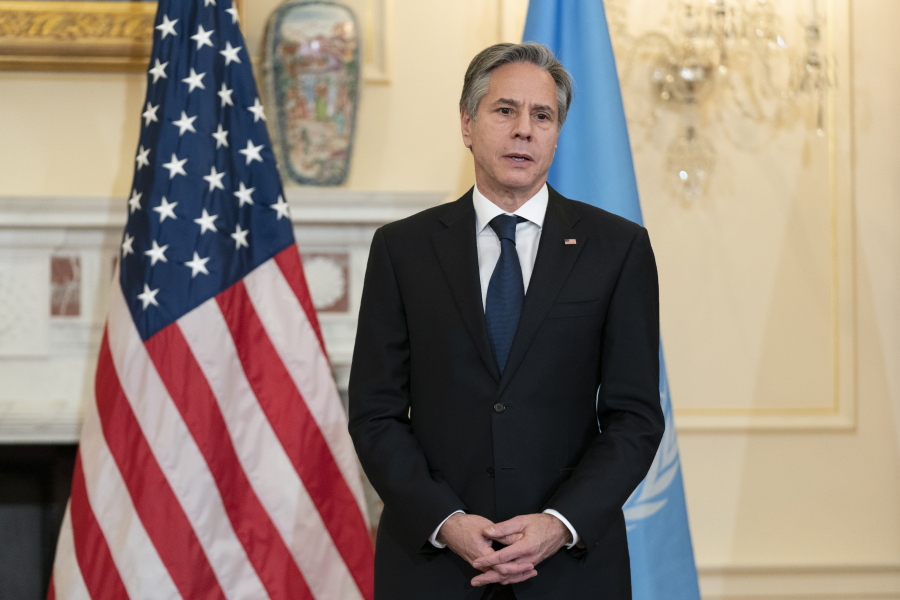 Secretary of State Antony Blinken speaks in the Benjamin Franklin State Dining Room during a meeting with International Organization on Migration Director General Antonio Vitorino, at the State Department, Monday, Nov. 15, 2021, in Washington.