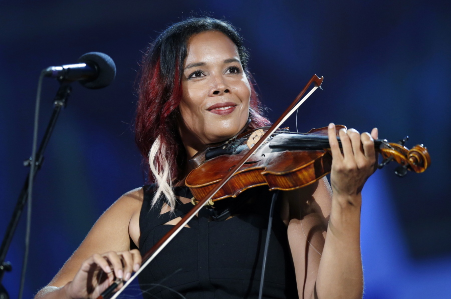 Rhiannon Giddens performs July 3, 2018, during rehearsal for the Boston Pops Fireworks Spectacular in Boston. Giddens will participate in an online fundraiser for the environment that will be shown on YouTube.