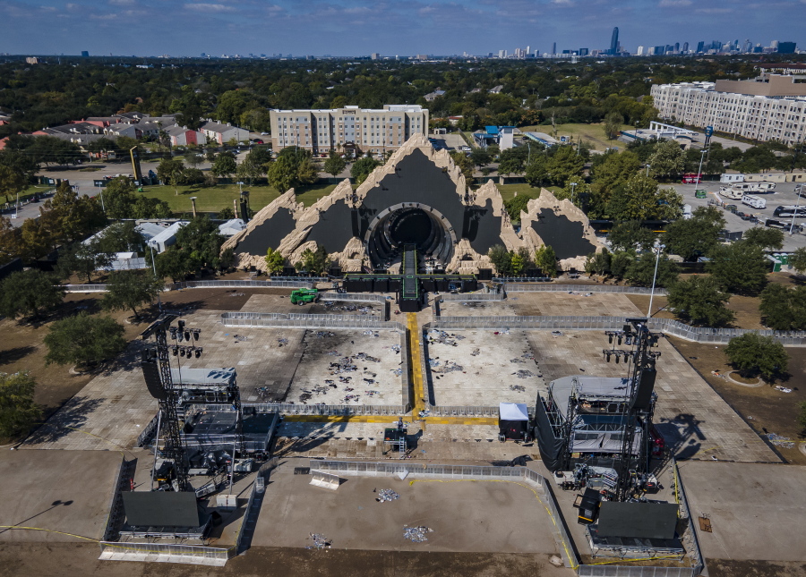 The Astroworld main stage where Travis Scott was performing Friday evening where a surging crowd killed eight people, sits full of debris from the concert,  in a parking lot at NRG Center on Monday, Nov. 8, 2021, in Houston.