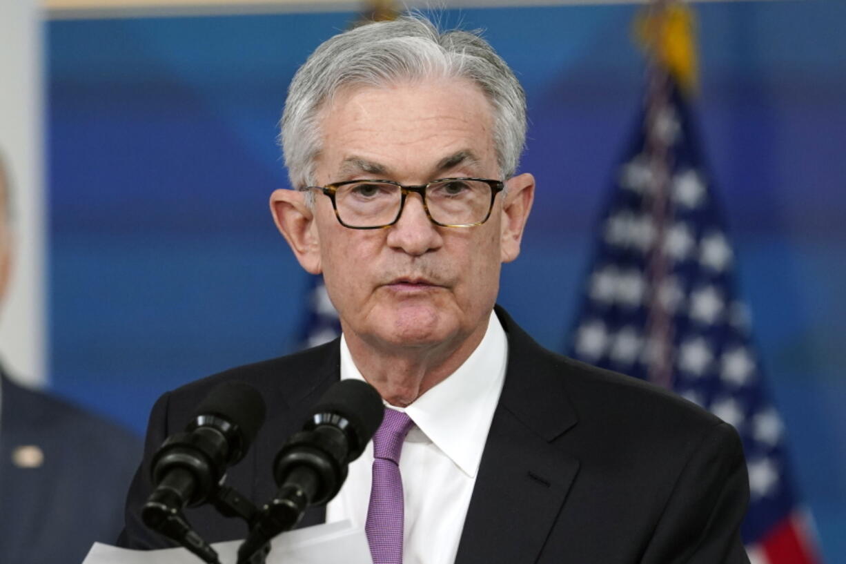 FILe - Federal Reserve Chairman Jerome Powell speaks during an event in the South Court Auditorium on the White House complex in Washington, on Nov. 22, 2021. Powell says that the appearance of a new COVID-19 variant could slow the economy and hiring. He also says it raises uncertainty about inflation. Powell says in remarks to be delivered to the Senate Banking Committee Tuesday that he recent increase in coronavirus cases and the emergence of the omicron variant pose downside risks to employment and economic activity and increased uncertainty for inflation.