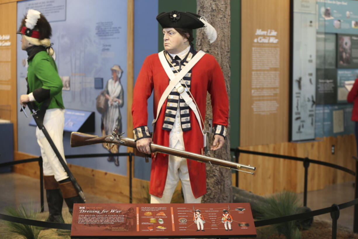 A exhibit of a British soldier is displayed at the Revolutionary War Visitor Center, Friday, Sept. 24, 2021, in Camden, S.C. The center was opened this year to capitalize on the upcoming 250th anniversary of the war as South Carolina promises to tell the full story of its role from the Founding Fathers to slavery.