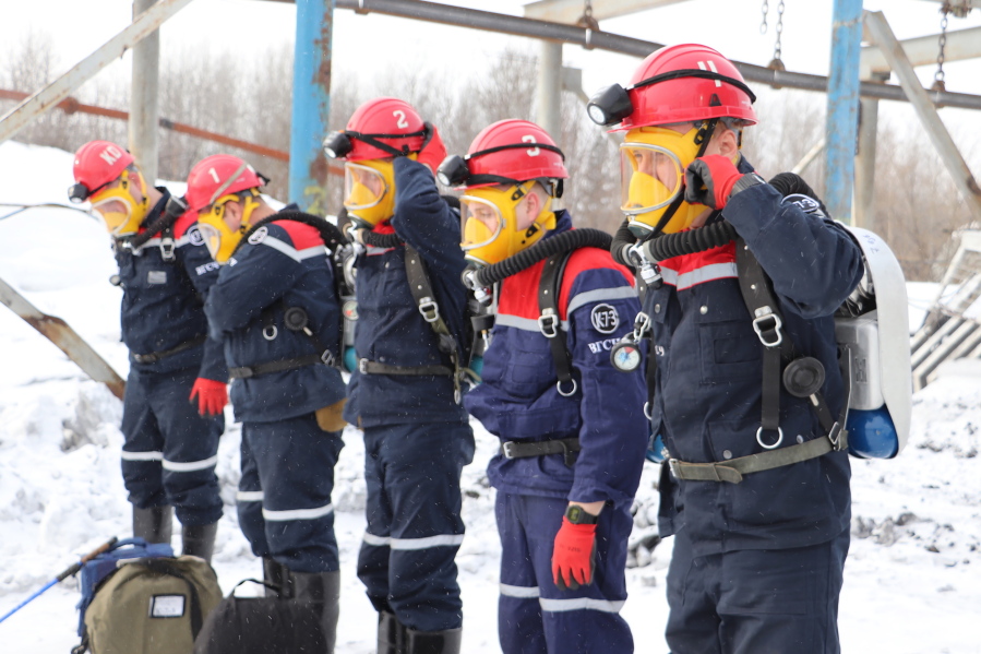 In this Russian Emergency Situations Ministry Thursday, Nov. 25, 2021 photo, rescuers prepare to work at a fire scene at a coal mine near the Siberian city of Kemerovo, about 3,000 kilometres (1,900 miles) east of Moscow, Russia,. Russian authorities say a fire at a coal mine in Siberia has killed nine people and injured 44 others. Dozens of others are still trapped. A Russian news agency says the blaze took place in the Kemerovo region in southwestern Siberia.