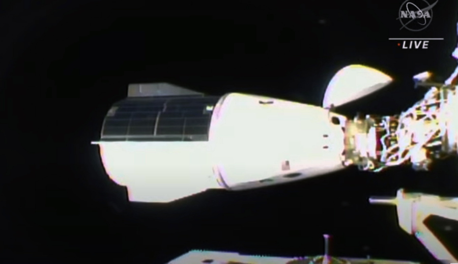 This image from video provided by NASA shows the SpaceX Dragon docking with the International Space Station, Thursday, Nov. 11, 2021. A SpaceX capsule carrying four astronauts pulled up Thursday at the International Space Station, their new home until spring. It took 21 hours for the flight from NASA's Kennedy Space Center to the glittering outpost.