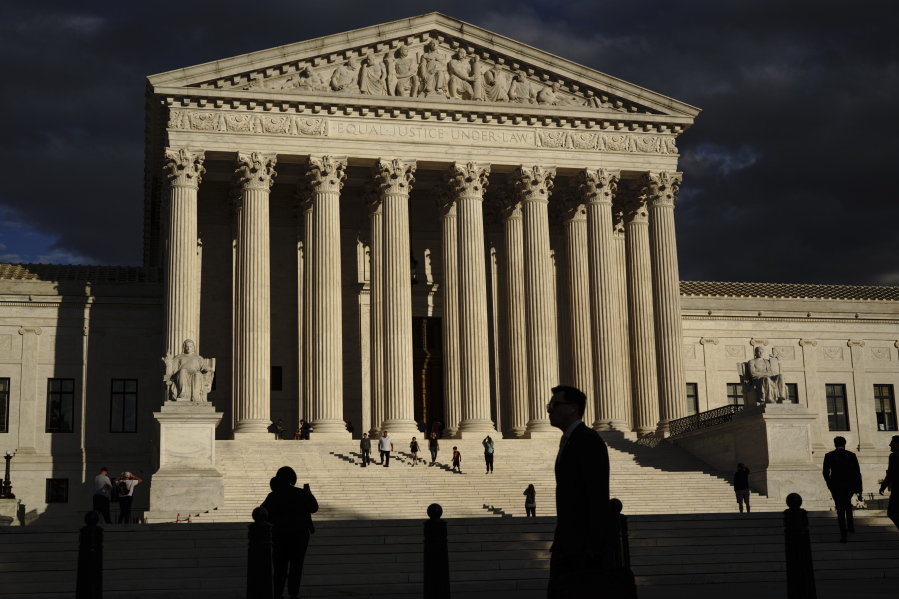 FILE - The Supreme Court is seen at dusk Oct. 22, 2021, in Washington. (AP Photo/J.