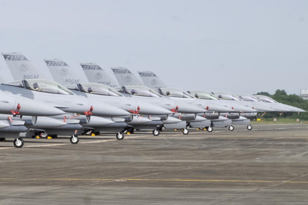 Newly commissioned upgraded F-16V fighter jets are seen at Air Force base in Chiayi in southwestern Taiwan Thursday, Nov. 18, 2021. Taiwan has deployed the most advanced version of the F-16 fighter jet in its Air Force, as the island steps up its defense capabilities in the face of continuing threats from China.