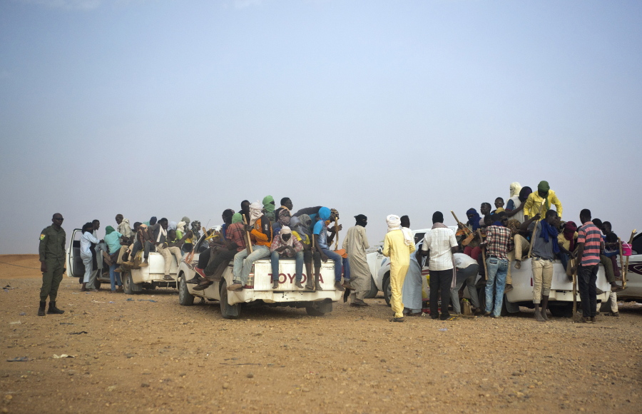 Nigerians and third-country migrants head toward Libya from Agadez, Niger, on June 14, 2018. The more than 66,000 United Nations peacekeepers are confronting greater threats today because conflicts have become more complex.