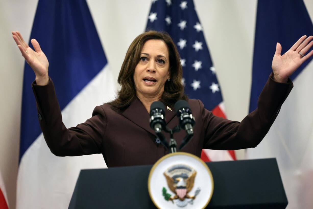 U.S Vice-President Kamala Harris speaks during a press conference in Paris Friday, Nov. 12, 2021. U.S. Vice President Kamala Harris and French President Emmanuel Macron agreed Wednesday that their countries are ready to work together again, after a diplomatic drama surrounding a submarine deal that put the relationship at a historic low.