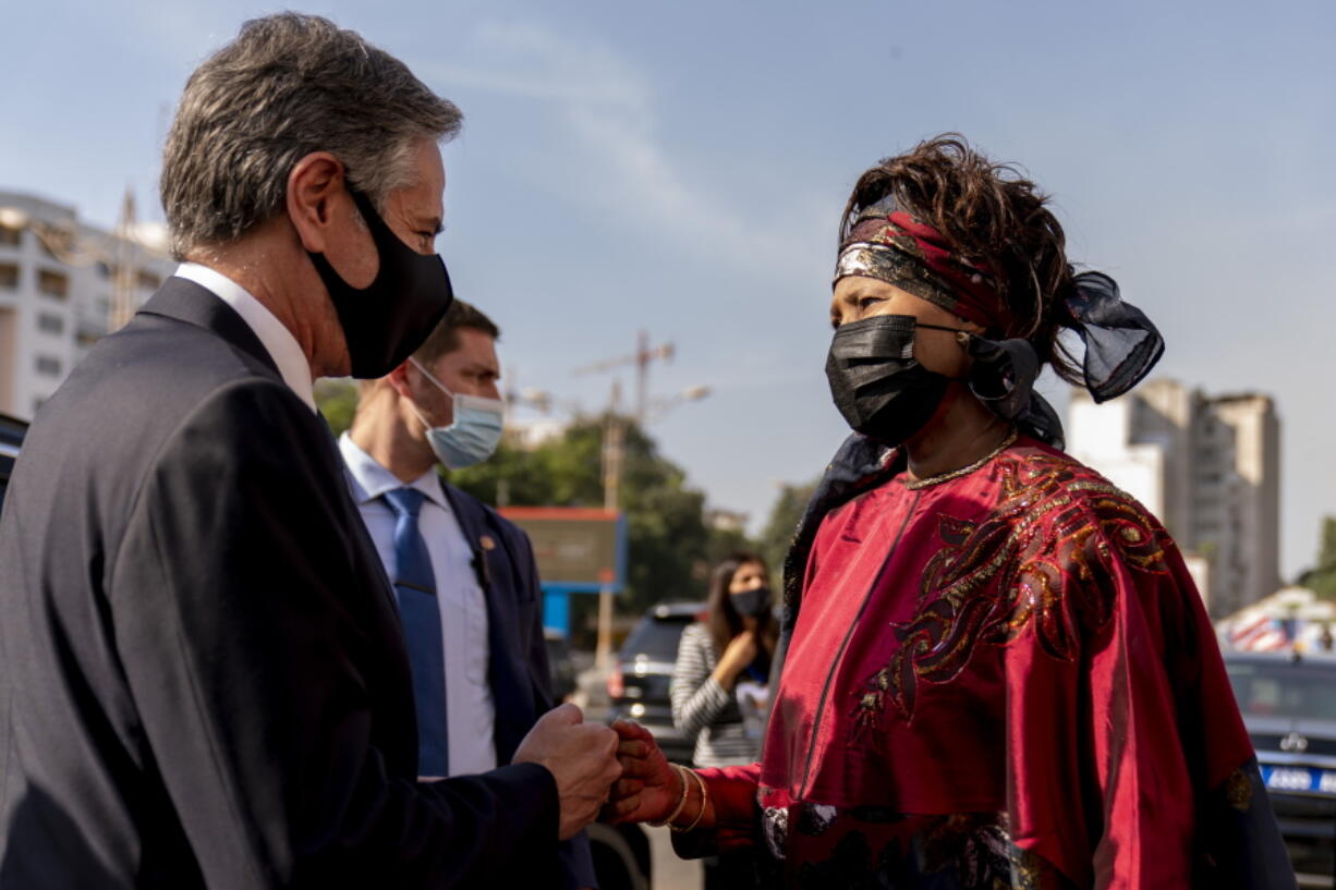Secretary of State Antony Blinken, accompanied by Senegalese Foreign Minister Aissata Tall Sall, departs following a news conference at the Ministry of Foreign Affairs in Dakar, Senegal, Saturday, Nov. 20, 2021. Blinken is on a five day trip to Kenya, Nigeria, and Senegal.