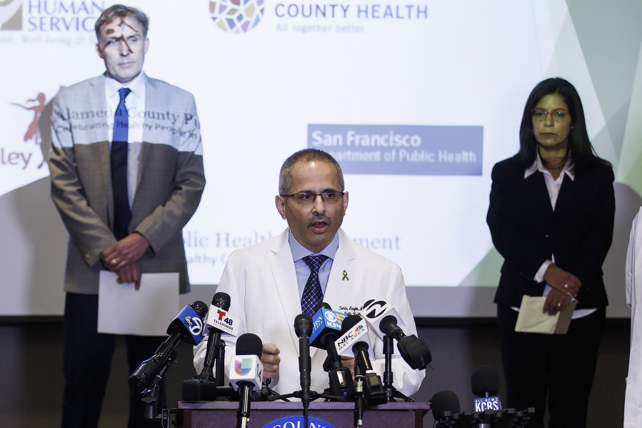 FILE - In this March 16, 2020, file photo, Tomas Aragon, the health officer for the city and county of San Francisco, speaks during a news conference in San Jose, Calif. In a letter to health providers dated Tuesday, Nov. 9. 2021, Aragon, now the State Public Health Officer, told providers they should "not turn a patient away who requesting a booster" if they are age 18 and up and it has been six months since they had their second Moderna or Pfizer vaccine or two months since their single Johnson & Johnson shot.