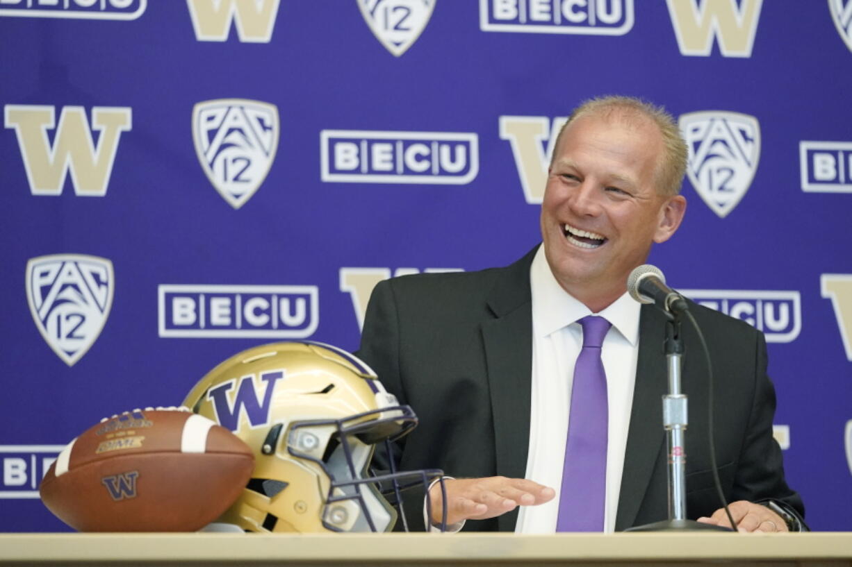 Kalen DeBoer speaks during a news conference, Tuesday, Nov. 30, 2021, in Seattle, to introduce him as the new head NCAA college football coach at the University of Washington. DeBoer has spent the past two seasons as head football coach at Fresno State. (AP Photo/Ted S.