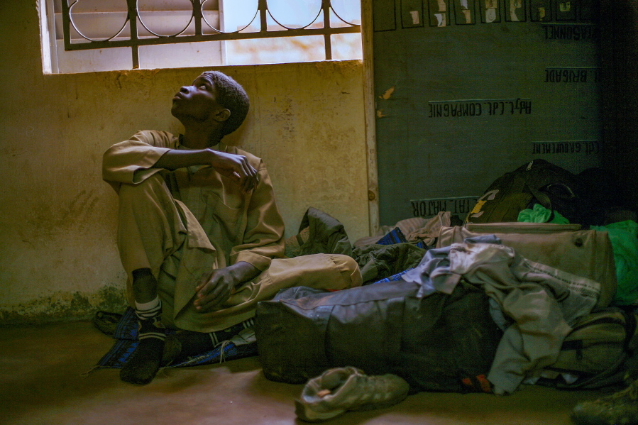 Adama Drabo, 16, who was arrested on suspicion of working for Islamic militant group MUJAO, sits in the police station in 2013 in Sevare, some 385 miles north of Mali's capital Bamako.