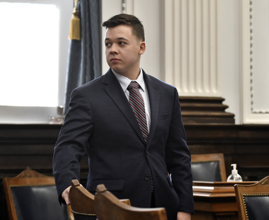 Kyle Rittenhouse looks back to the gallery during a break in testimony from Gage Groskreutz during his trial at the Kenosha County Courthouse in Kenosha, Wis., on Monday, Nov. 8, 2021.