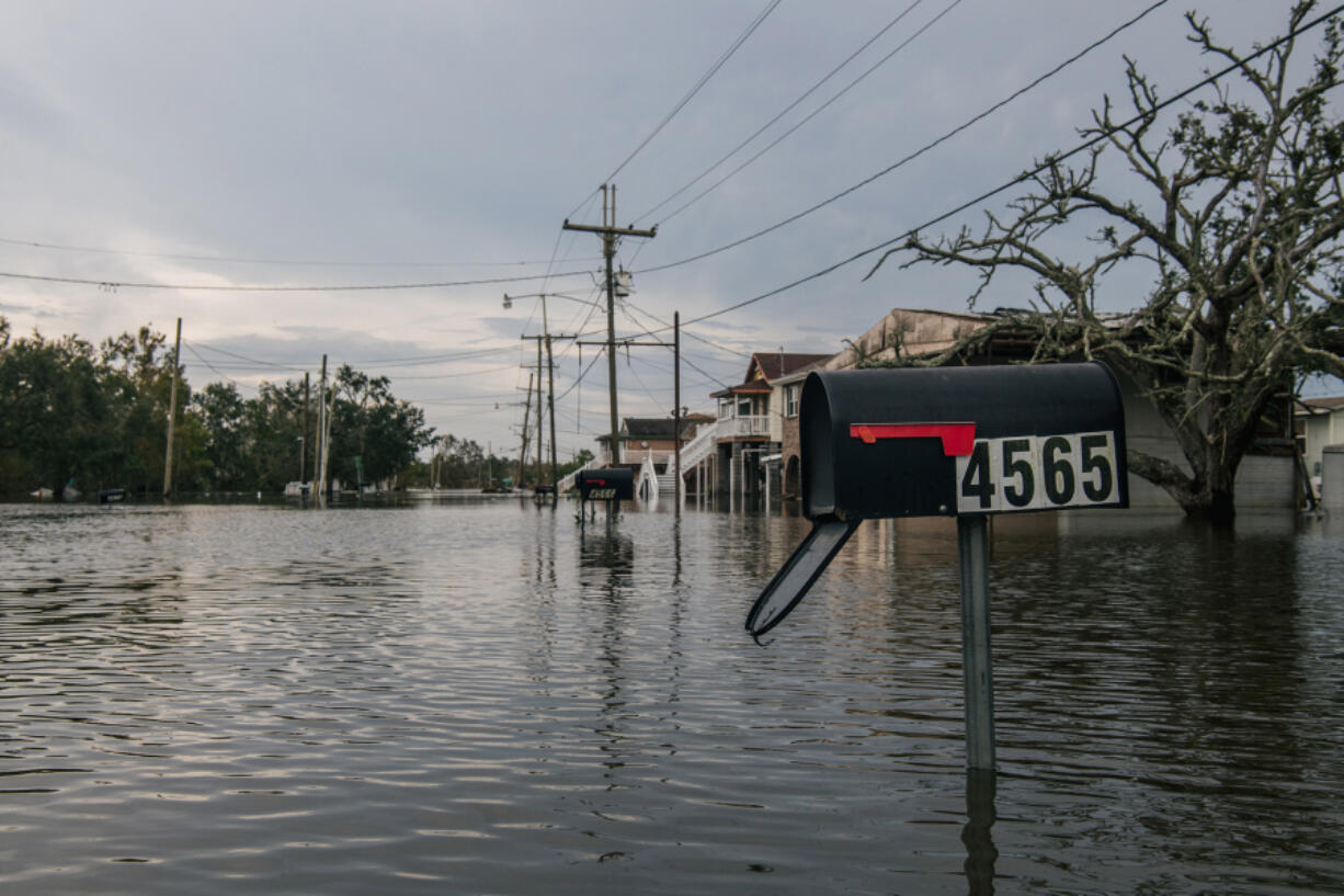 A mailbox is seen in floodwater Sept. 1 in Jean Lafitte, La. Hurricane Ida made landfall as a Category 4 hurricane on Aug. 29 in Louisiana and brought flooding and wind damage along the Gulf Coast.