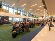 As part of the PDX Next project, Portland International Airport unveiled its remodeled Concourse B Dec. 8. The newly remodeled terminal has floor-to-ceiling windows, art, seating and restaurants like Good Coffee and Screen Door, which will open next spring.