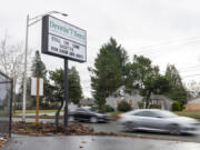 Cars drive past a sign for the newly renamed Dennis' 7 Dees, formerly Shorty's Garden Center, on Friday at 10006 S.E. Mill Plain Blvd. The popular garden center has been owned by Dennis' 7 Dees for the past five years and is now taking its owner's brand.