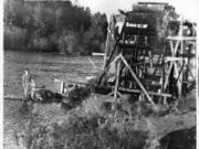 Fish wheels, like the one in this 1903 photo along the Washougal River, floated on deeper rivers with salmon runs from 1866 until they were banned in 1934. Today, they are used to catch salmon for research because the fish can be returned unharmed to the river. Alaska’s Copper River is the only place in the U.S. today that permits fish wheels.