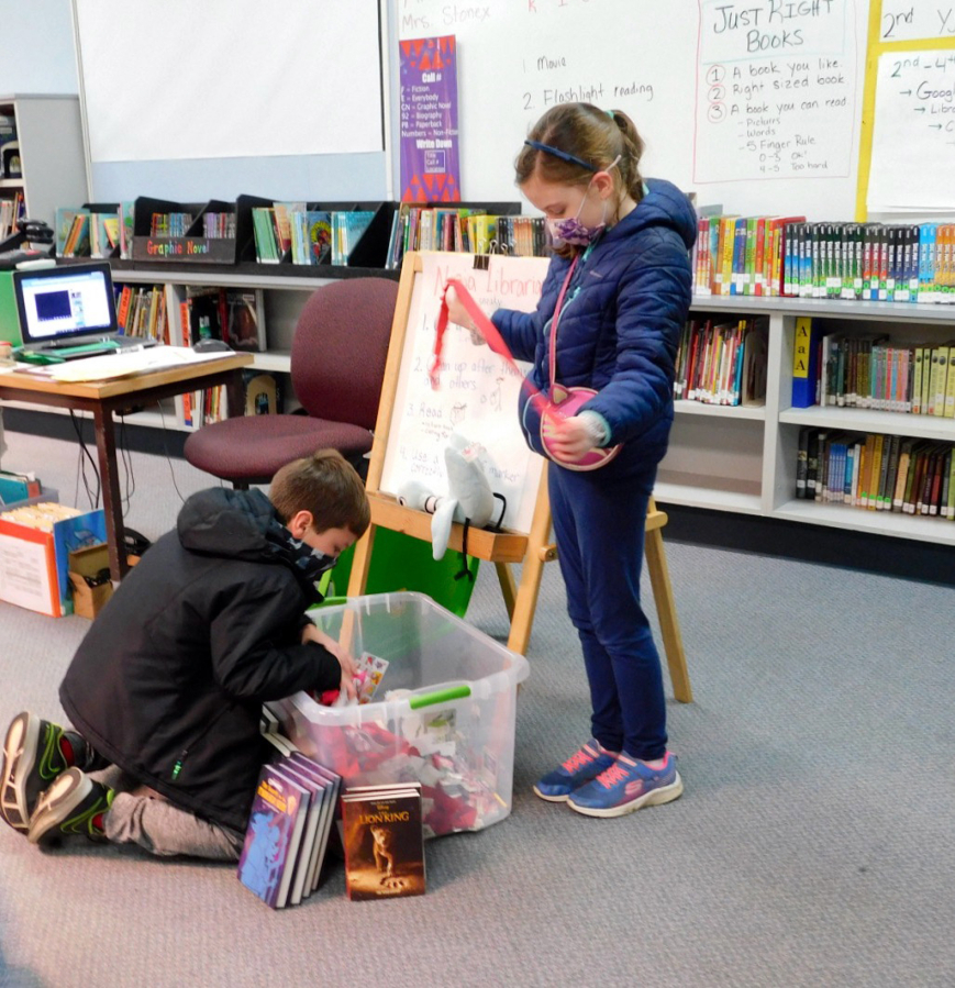 RIDGEFIELD: Battle Ground Public Schools sent 40 boxes of their excess books to Ridgefield school libraries. The popularity and quantity of donated books were a perfect gift for Ridgefield's school library programs.