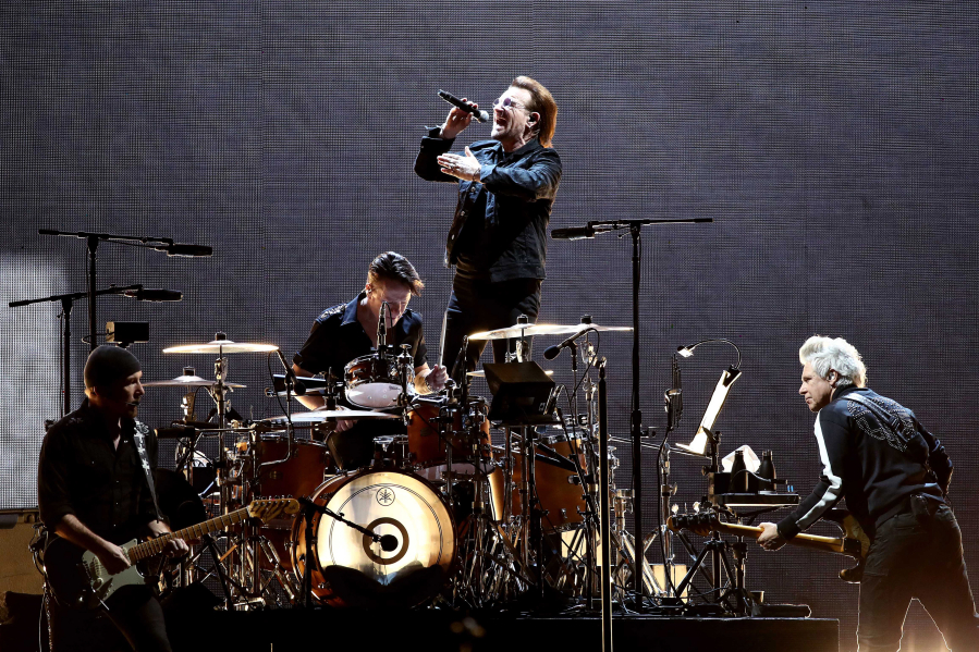 From left, The Edge, Larry Mullen Jr., Bono and Adam Clayton of U2 perform at the Gocheok Sky Dome on Dec. 8, 2019, in Seoul, South Korea.