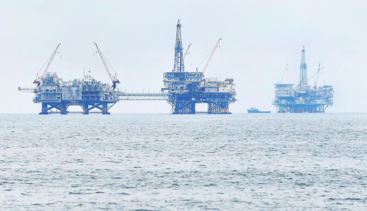 Drilling platforms Elly, left, Ellen, center, and Eureka, right, are seen off the southern California coast on Oct. 6, 2021. (Frederic J.
