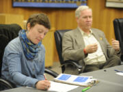 Alexandra "Alex" Yost takes notes while Blaine Peterson talks during a 2018 meeting of the Washougal Citizens Advisory Committee, at Washougal City Hall.