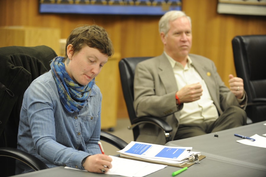 Alexandra "Alex" Yost takes notes while Blaine Peterson talks during a 2018 meeting of the Washougal Citizens Advisory Committee, at Washougal City Hall.