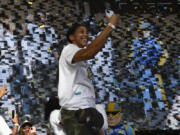Chicago Sky forward/center Candace Parker (3) takes a selfie as teammates celebrate their 2021 WNBA Championship during a rally at Millennium Park on Tuesday, Oct. 19, 2021, in Chicago.