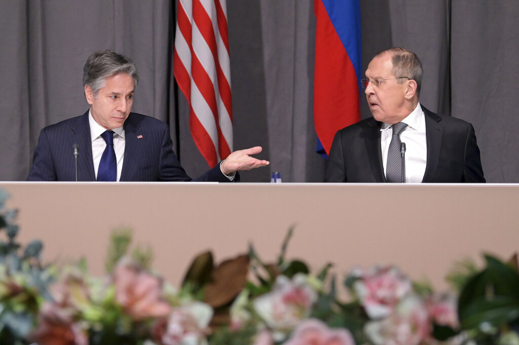US Secretary of State Antony Blinken, left, and Russian Foreign Minister Sergey Lavrov meet on the sidelines of an Organization for Security and Co-operation in Europe (OSCE) meeting, in Stockholm, Sweden, Thursday, Dec. 2, 2021.