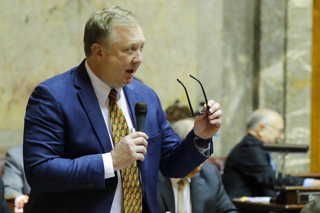 FILE - Washington Sen. Doug Ericksen, R-Ferndale, speaks on the Senate floor on Jan. 15, 2020, at the Capitol in Olympia, Wash.  Ericksen died Friday, Dec. 17, 2021, after saying in November that he tested positive for COVID-19, although his cause of death was not immediately confirmed on Saturday. He was 52.   (AP Photo/Ted S.