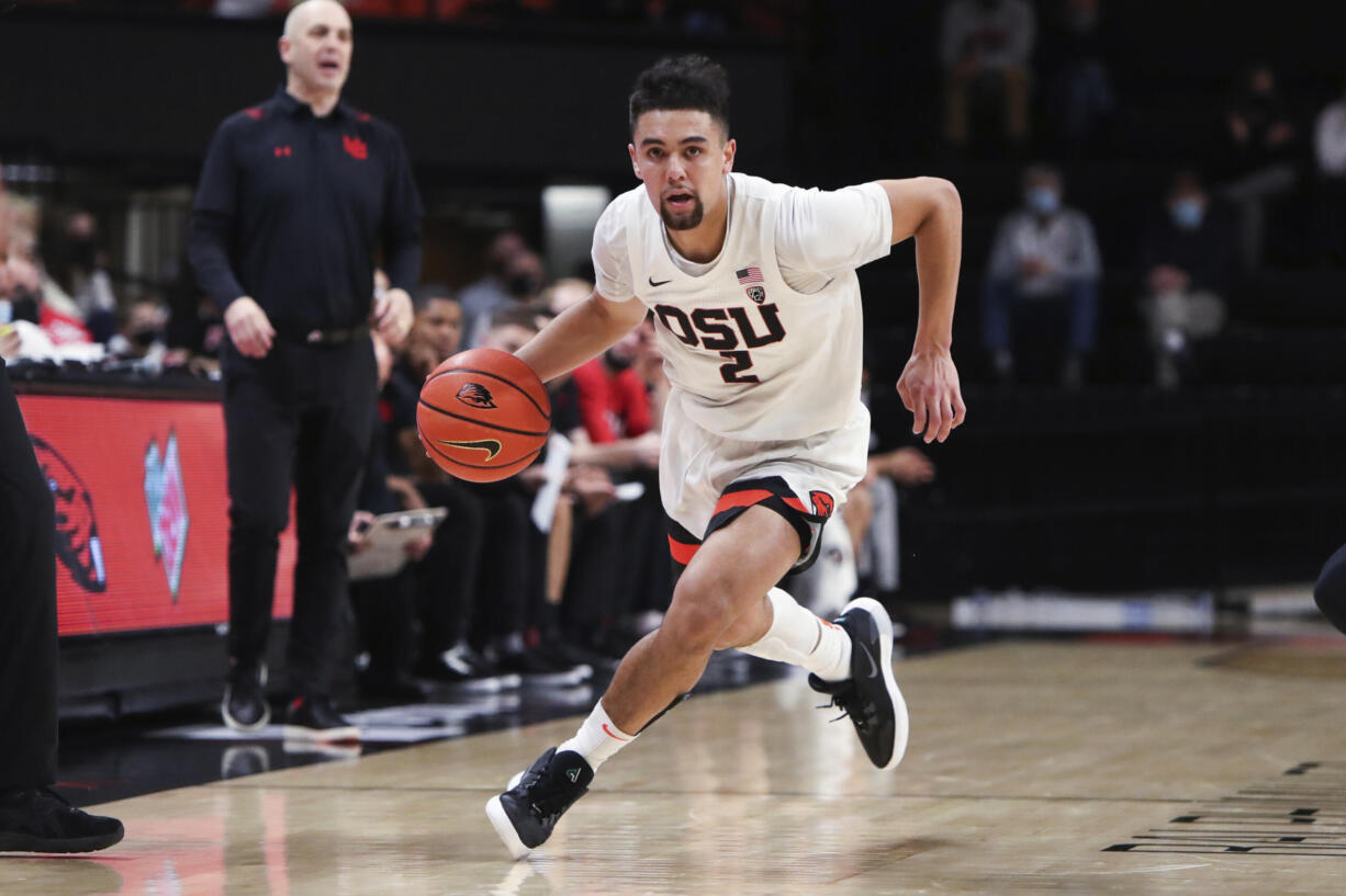 Oregon State's Jarod Lucas (2) sprints up the court during the second half of the team's NCAA college basketball game against Utah in Corvallis, Ore., Thursday, Dec. 30, 2021. Oregon State won 88-76.