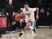 Oregon State's Jarod Lucas (2) sprints up the court during the second half of the team's NCAA college basketball game against Utah in Corvallis, Ore., Thursday, Dec. 30, 2021. Oregon State won 88-76.