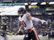 Chicago Bears tight end Jimmy Graham reacts after scoring a touchdown on a pass reception in the end zone against the Seattle Seahawks during the second half of an NFL football game, Sunday, Dec. 26, 2021, in Seattle. The Bears won 25-24.