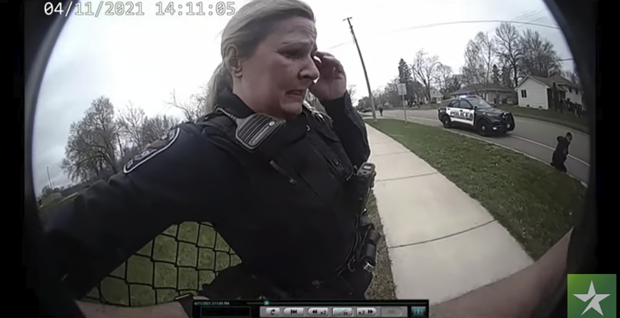 In this screen grab police body cam video is shown in court on Friday, Dec. 10, 2021 at Hennepin County Courthouse in Minneapolis, Minn., former Brooklyn Center police Officer Kim Potter reacts after a traffic stop in which Daunte Wright was shot on April 11, 2021.  Potter is charged with first- and second-degree manslaughter in the April 11 shooting of Wright, a 20-year-old Black motorist, following a traffic stop in the Minneapolis suburb of Brooklyn Center.