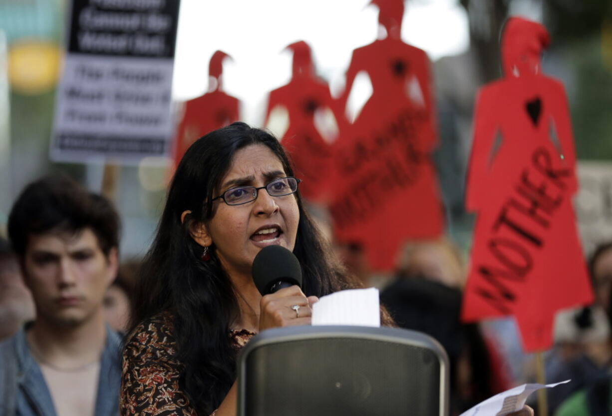FILE - Seattle city councilmember Kshama Sawant speaks during a protest against family separation at the border and other immigration-related issues on Aug. 1, 2019, outside ICE headquarters in Seattle. Henry Bridger II, a former supporter of Sawant, is leading an effort to recall her, and ballots are due Tuesday, Dec. 7, 2021 in Seattle's Third District. The results could further shift power in the Northwest's largest city and deal another setback to leftist activists who saw business-friendly candidates win a council seat and the mayor's office in the November 2021 general election. (AP Photo/Ted S.