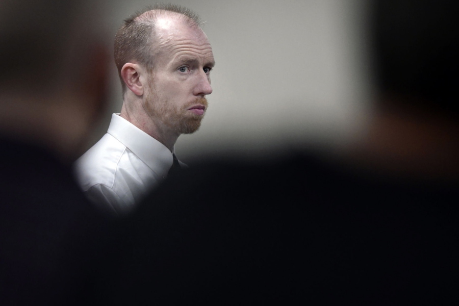 FILE - Chad Isaak, of Washburn, N.D., appears during the third day of his murder trial at the Morton County Courthouse in Mandan, N.D., on Aug. 4, 2021. Isaak is scheduled for sentencing Tuesday, Dec. 28, 2021, in the stabbing and shooting deaths of four people at a North Dakota property management firm last year. Isaak is facing life in prison without parole. A jury in August found him guilty in the grisly deaths of RJR Maintenance and Management co-owner Robert Fakler and three employees.
