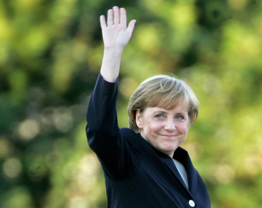 Angela Merkel arrives for a debate with Chancellor Gerhard Schroeder at a television studio in Berlin on Sept. 4, 2005.