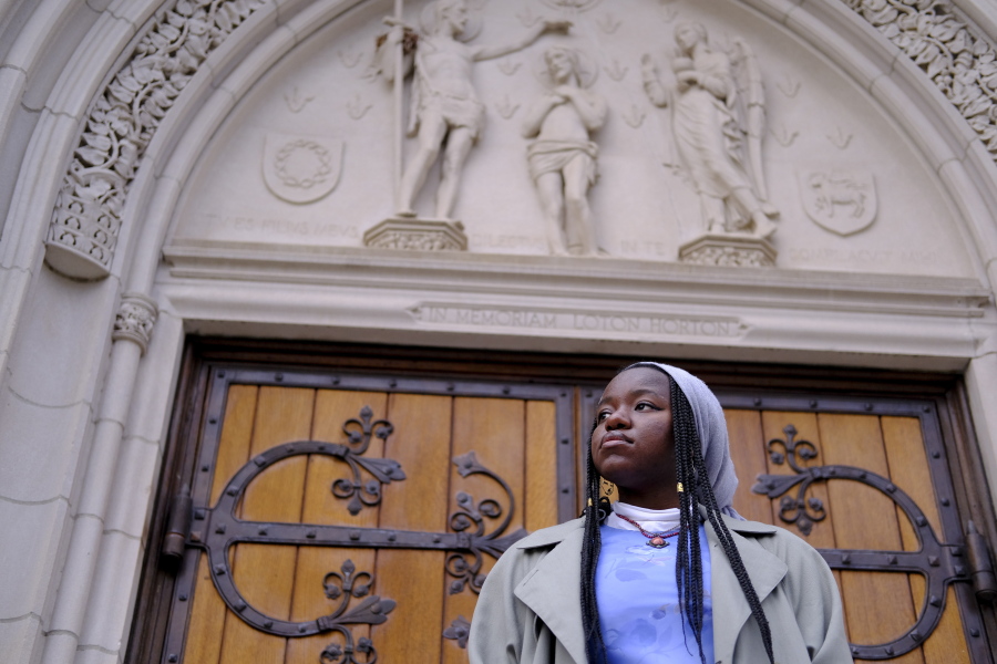 Nathalie Charles, seen outside the Princeton University Chapel in Princeton, N.J., on Wednesday, left her Baptist church at the age of 15 because as a queer woman of Haitian descent, she felt unwelcome in her congregation, with its conservative views on immigration, gender and sexuality.