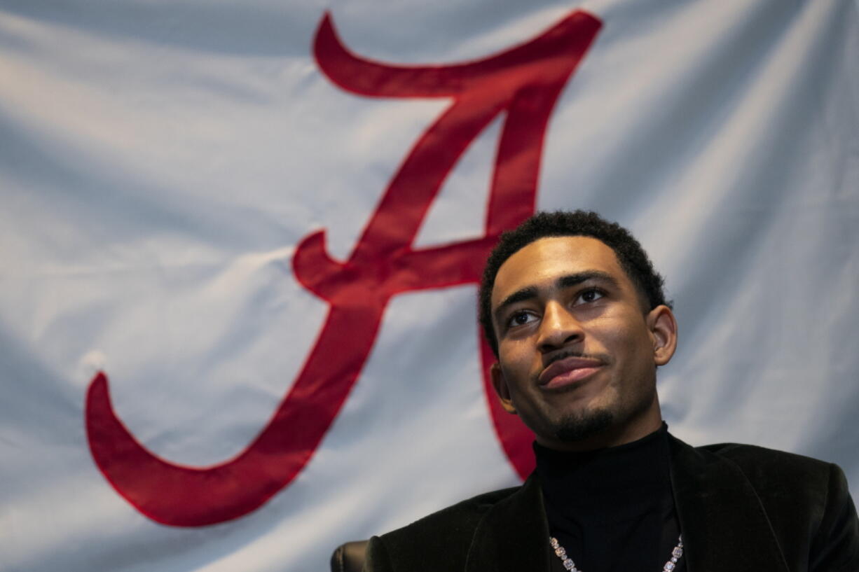 Heisman Trophy finalist Alabama quarterback Bryce Young speaks with members of the media before attending the Heisman Trophy award ceremony, Saturday, Dec. 11, 2021, in New York.