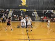 Hudson's Bay and Camas get ready for the opening tip of their non-league girls basketball tilt Tuesday in Vancouver.