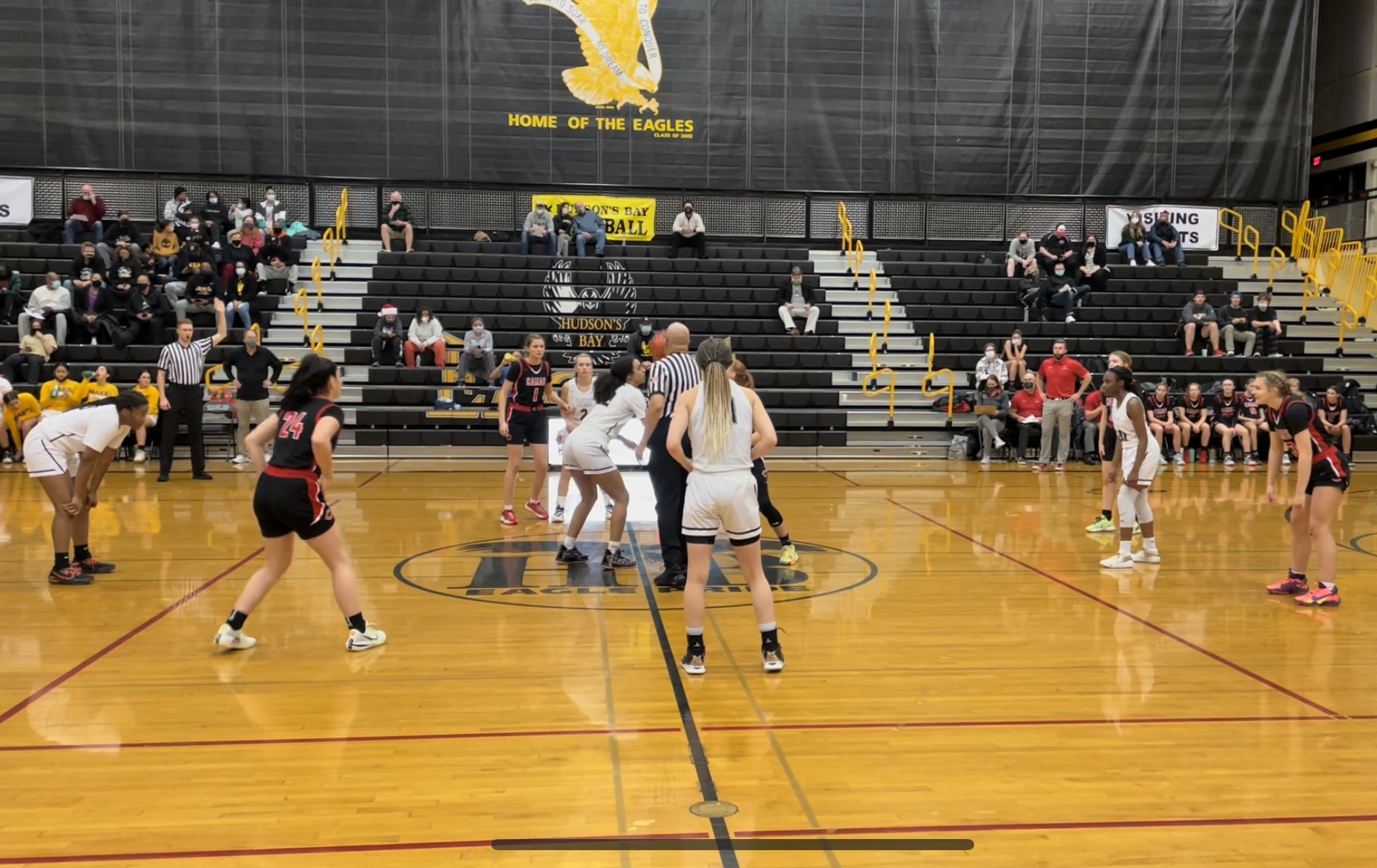 Hudson's Bay and Camas get ready for the opening tip of their non-league girls basketball tilt Tuesday in Vancouver.